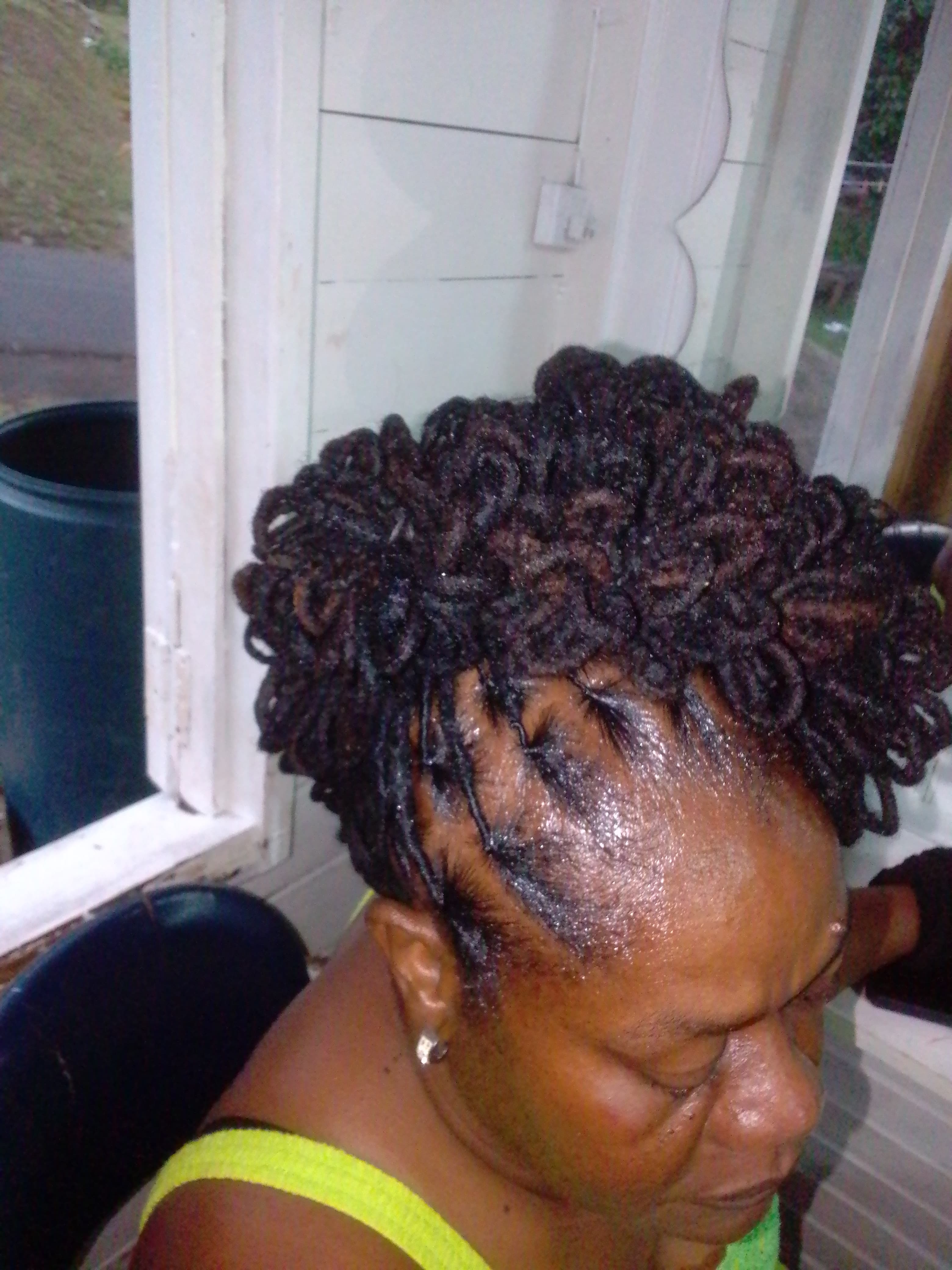 Loc retwist and style (petal bun)